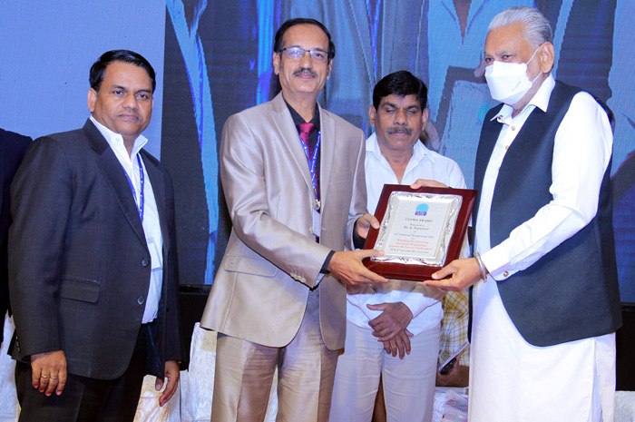 Dr. A. Natarajan receiving CLFMA award